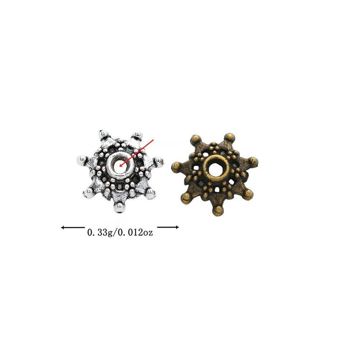 Ship Wheel Spacer Bead with a wheel-like rim with raised dots in 2 Metal Finishes