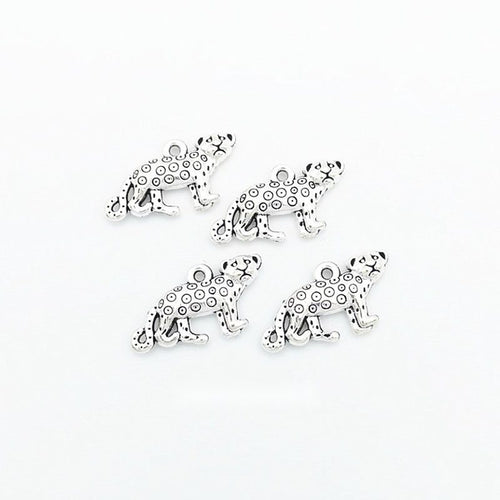 Tiny Running Leopard Charm shown in all pictured finishes on a white background