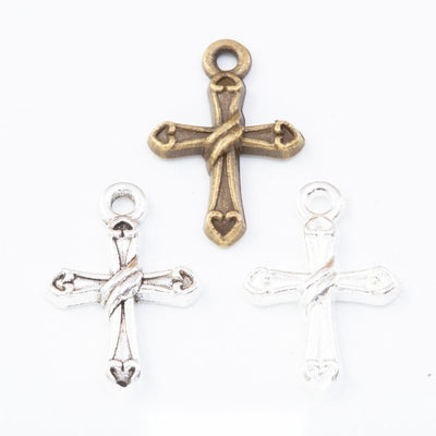 Front comparison of simple cross metal component in 3 finishes