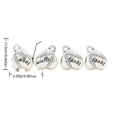 Heart-shaped large-hole bead engraved with love-themed lettering shown in arranged finish comparison