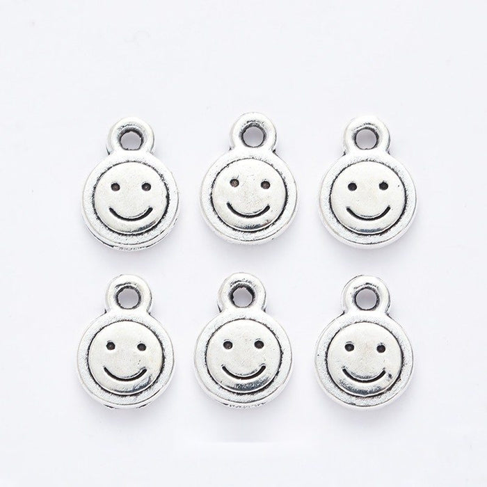 Round Smiley Face Metal Charm in 1 Pictured Finish