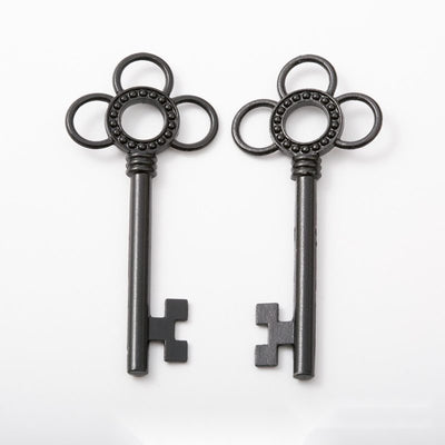 Flower-Bow Skeleton Key metal design group view on a light background
