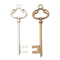 Antique Bronze and Silver Clover Bow Skeleton Key Charms view 1