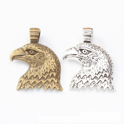 Eagle Head Charm finish comparison on a white background