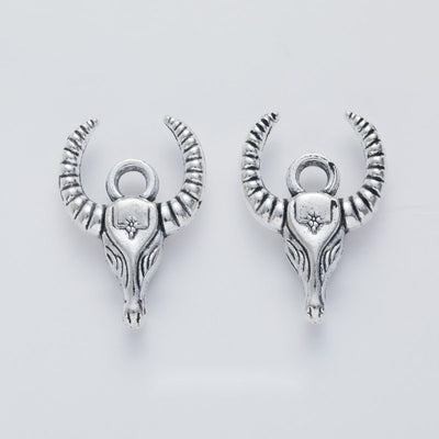 Curled Ram Head metal piece showing overall shape and available finishes