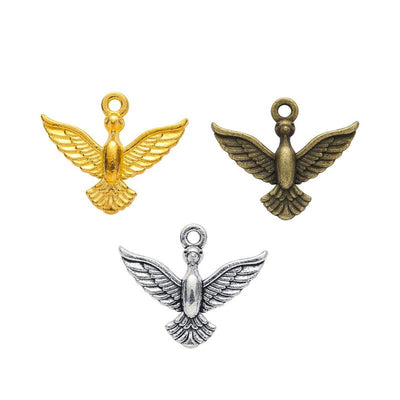 Grouped front views of flying eagle charms