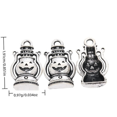 Jack O Lantern Lantern metal piece shown in Antique Silver beside printed specifications