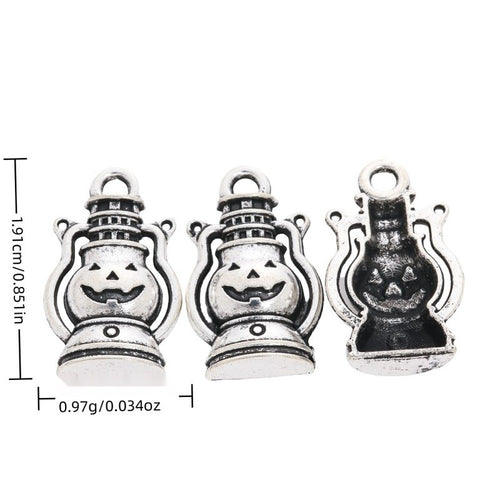 Jack O Lantern Lantern metal piece shown in Antique Silver beside printed specifications