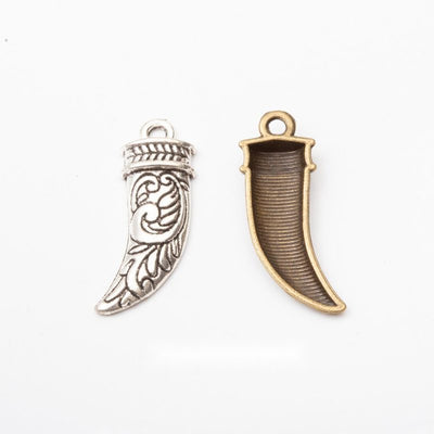 Curved Horn Charm finish comparison on a white background