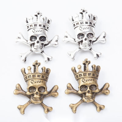 Crowned Skull And Crossbones components shown together in the available finishes