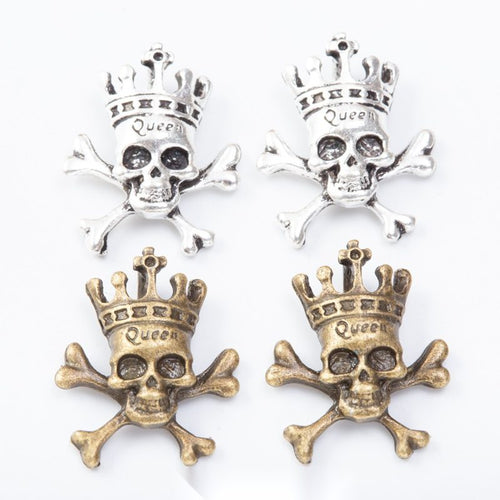Crowned Skull And Crossbones components shown together in the available finishes