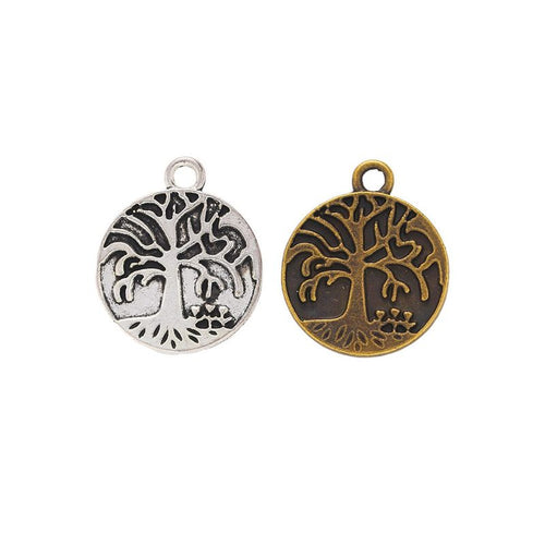 Round Tree of Life Charm finish assortment on a white background