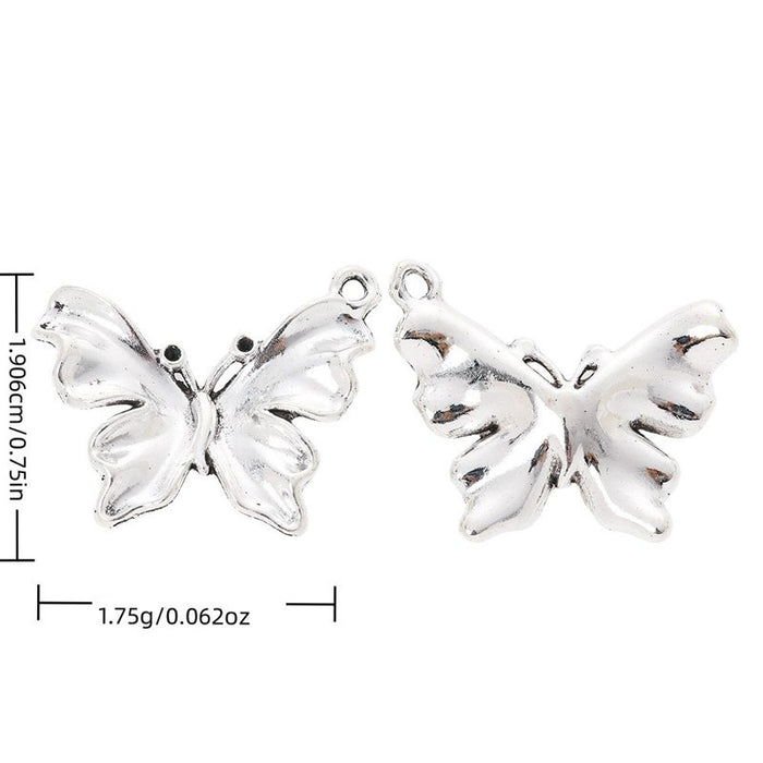 Raised Butterfly Alloy Charm in Antique Silver Finish