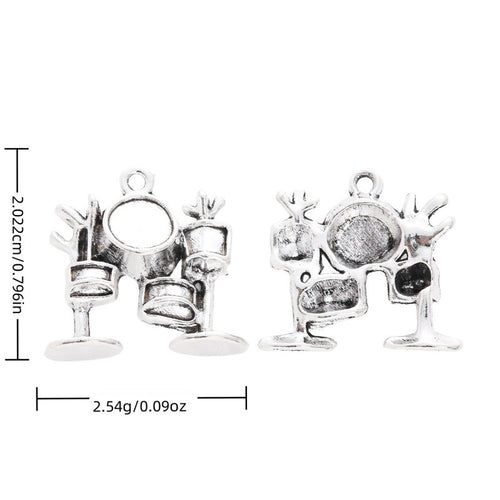 Metal drum kit charm, front and reverse views shown in the product image