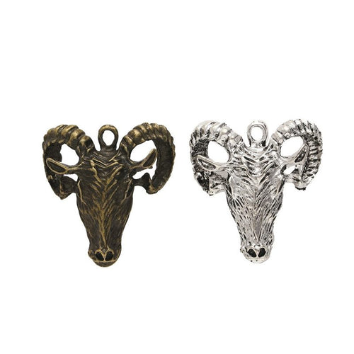Front display of sculpted ram head charm shown against a plain background.