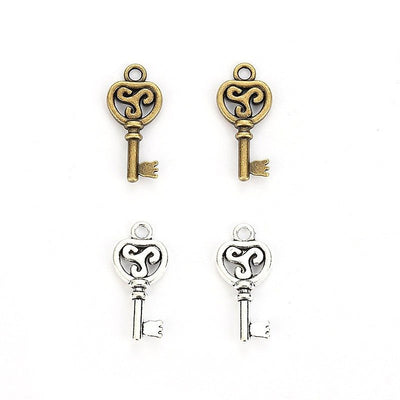 Scrollwork Heart Key metal piece shown in Antique Bronze, Antique Silver