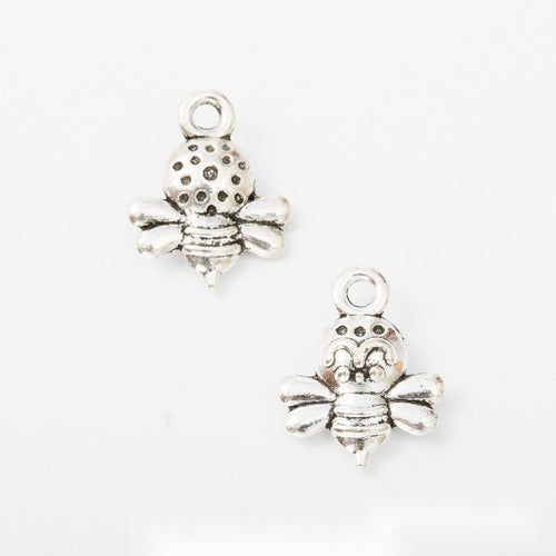 Group view of tiny bee styles on a white background