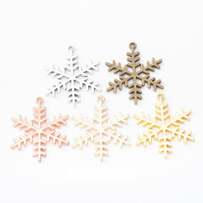 Snowflake metal component, grouped front view on white
