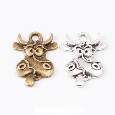 Cartoon Bull Head Metal Charm Pendant shown in the available visible finishes