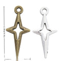 Elongated Star Charm with a long open star silhouette in 2 Metal Finishes view 1