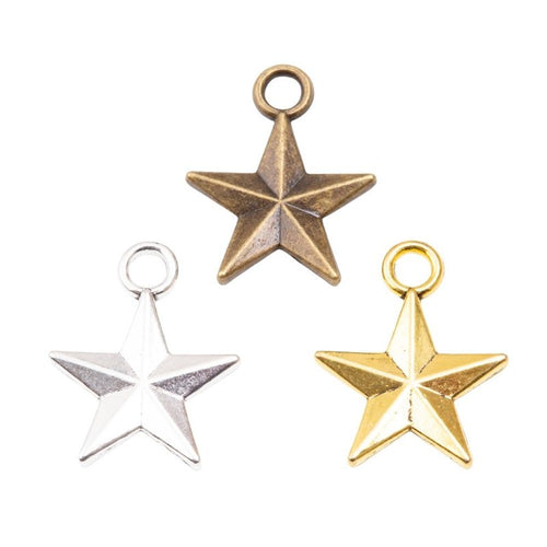 Assorted smooth five point star pendants displayed together on a white background