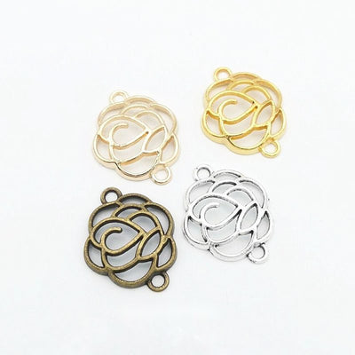 Product photo 1 of the openwork rose two-loop connector highlighting its open rose outline with one loop at the top and 