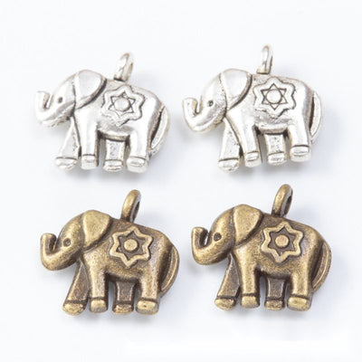 Group view of decorated elephant styles on a white background