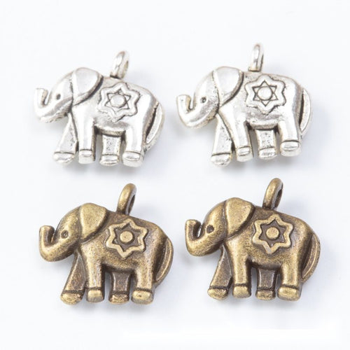 Group view of decorated elephant styles on a white background