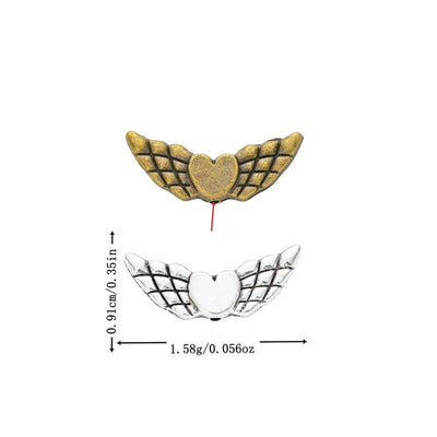 Winged Heart Spacer Bead finish comparison on a white background