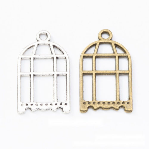 Tall arched cage with open bars and scalloped base shown in the available finishes