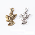 Peace Dove Charm with Olive Branch in Two Antique Finishes view 1