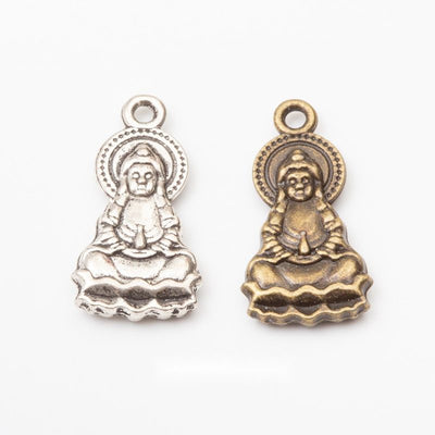 Seated Guanyin figure on a layered lotus base shown in the available finishes