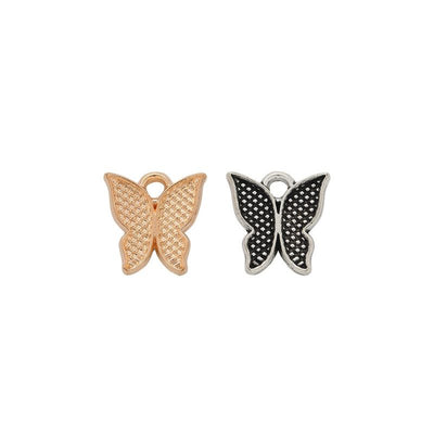 Front view of dotted butterfly pendant showing finish variation 1
