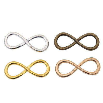 Assorted infinity link connectors arranged together on a white background