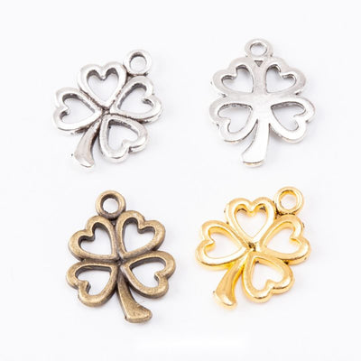 Openwork Four Leaf Clover metal pieces shown in the available finishes.