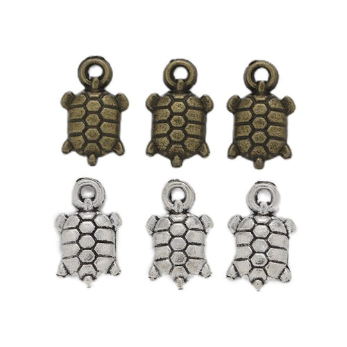 Tiny Textured Turtle Charm shown in all pictured finishes on a white background