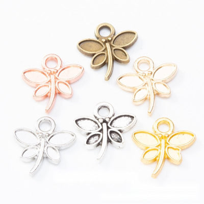 Overview of dragonfly charms in the available designs and finishes