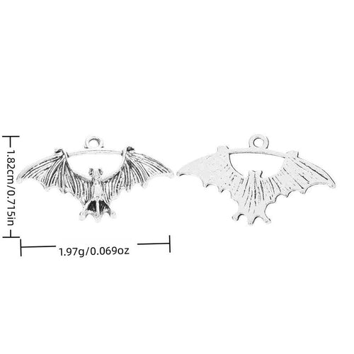 Flying Bat metal charm displaying front and reverse sides