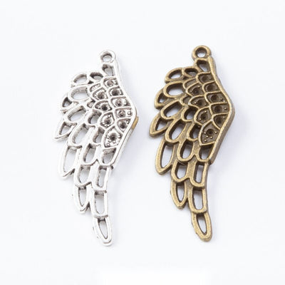Angel Wing Charm grouped finish options on a white background