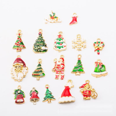 Front display of enamel Christmas charm collection shown against a plain background.