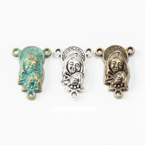 Assorted religious portrait connectors arranged together on a white background