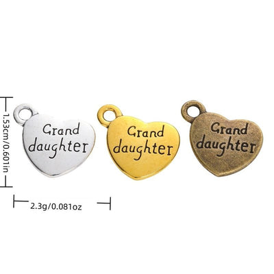 Finish overview of granddaughter engraved heart metal charm
