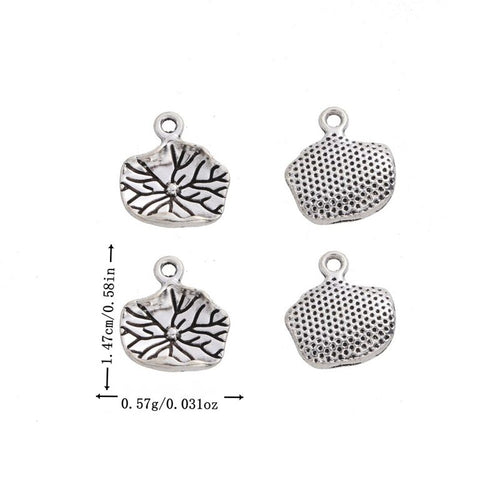 Antique Silver lotus leaf charm shown in an overview