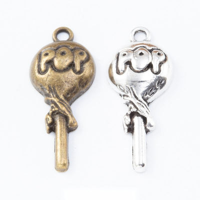 Lollipop key charm shown across the available finishes