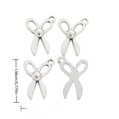 Front and reverse views of small scissors charms with measurement and weight guides