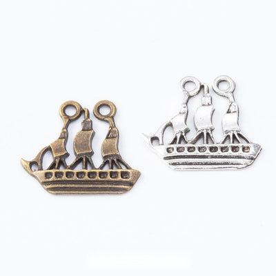 Grouped front views of sailing ship charms