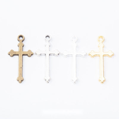 Finish assortment shown together of the simple cross charm
