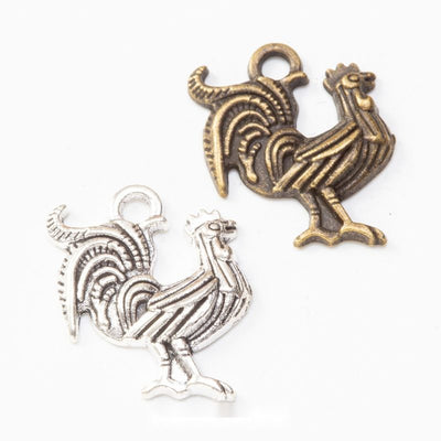 Rooster metal component, grouped front view on white
