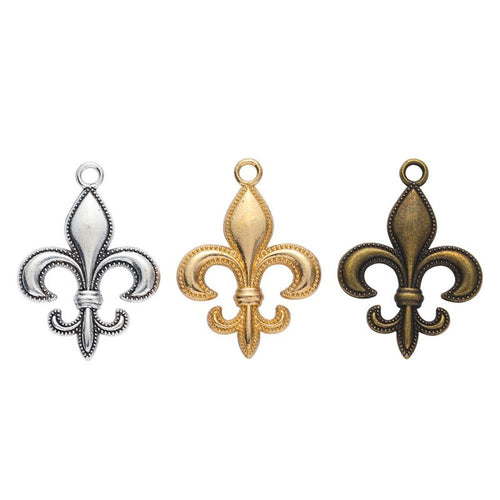 Group view of fleur-de-lis anchor charm showing all 3 pictured finish variants