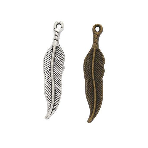 Product view of long feather charm showing a slim curved feather with fine engraved barbs and a round top loop